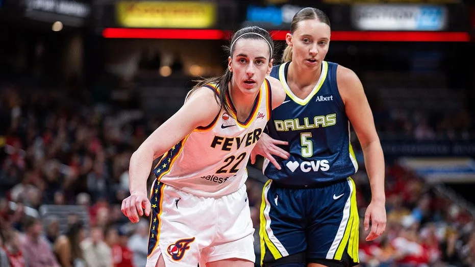 Tense Moment Between Caitlin Clark and Paige Bueckers Sparks On-Court Friction in Wings-Fever Matchup